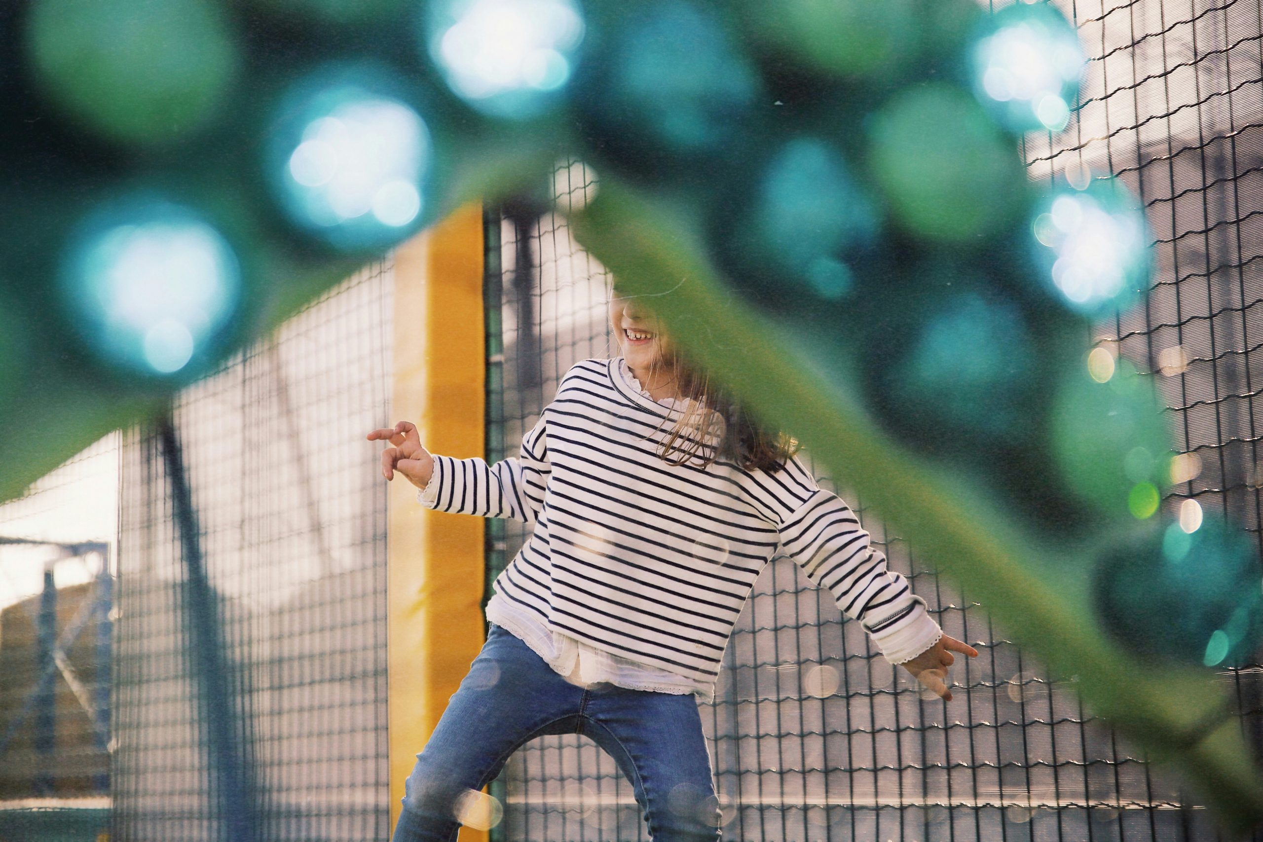 A child at soft play by Caroline Hernandez